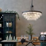 Håndlavet lysekrone i glas og jern – elegant belysning med klassisk udtryk