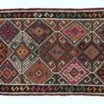 Vintage håndvævet kelim tæppe fra Malatya i Tyrkiet med geometriske mønstre i varme jordtoner