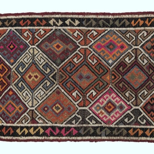 Vintage håndvævet kelim tæppe fra Malatya i Tyrkiet med geometriske mønstre i varme jordtoner